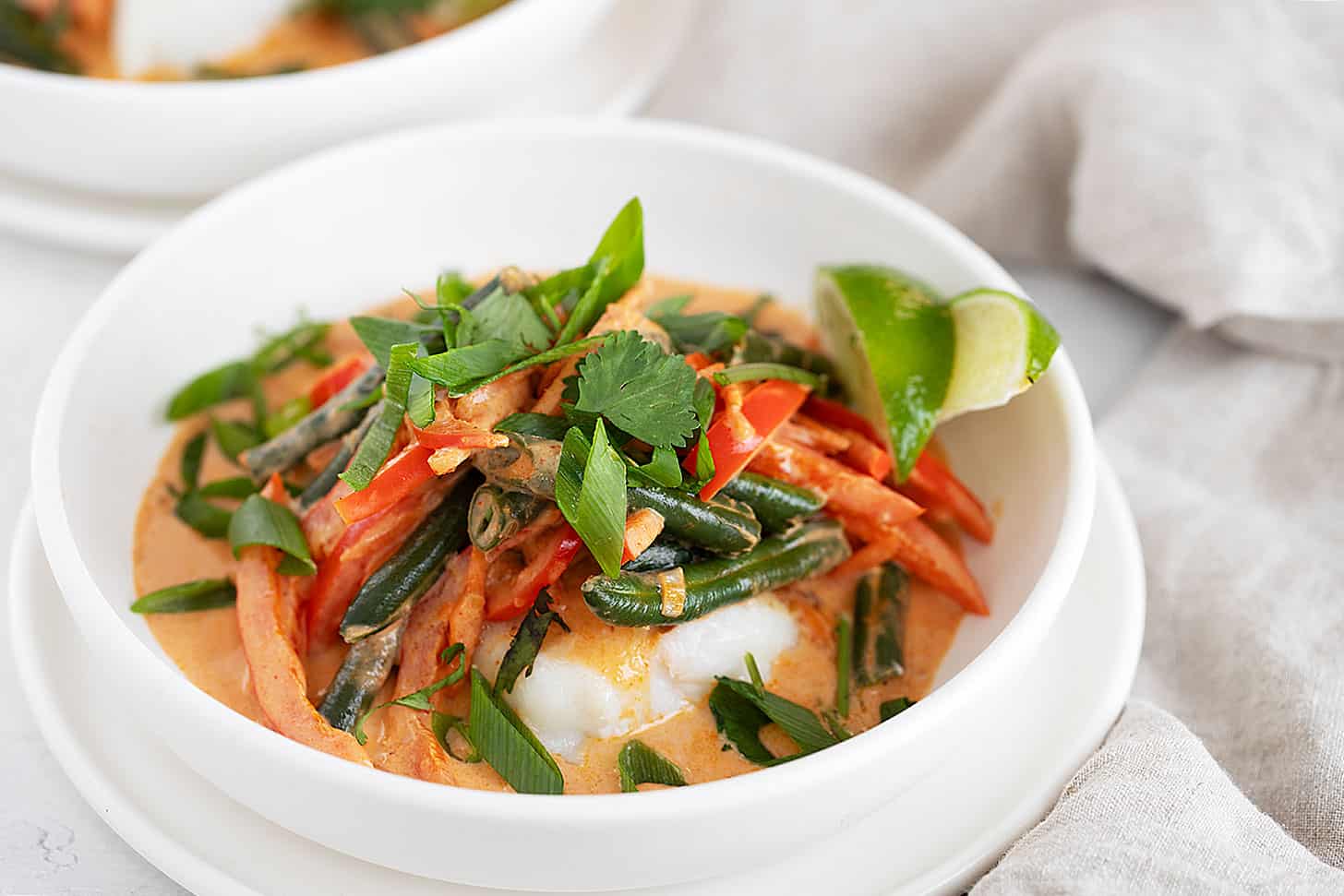 Thai red curry fish in bowl