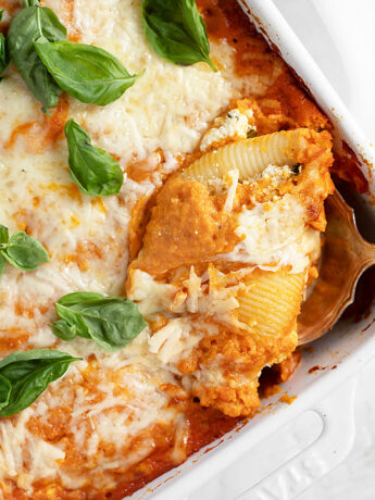 ricotta stuffed shells with butternut squash sauce in pan