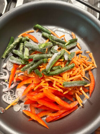 sauteeing vegetables in skillet