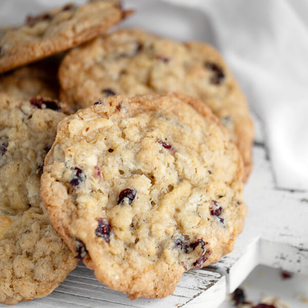 cranberry oatmeal white chocolate cookies on serving board