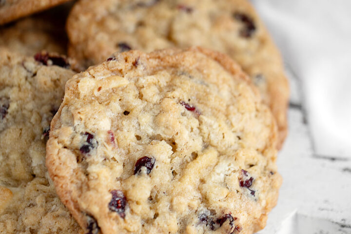 cranberry oatmeal white chocolate cookies on serving board