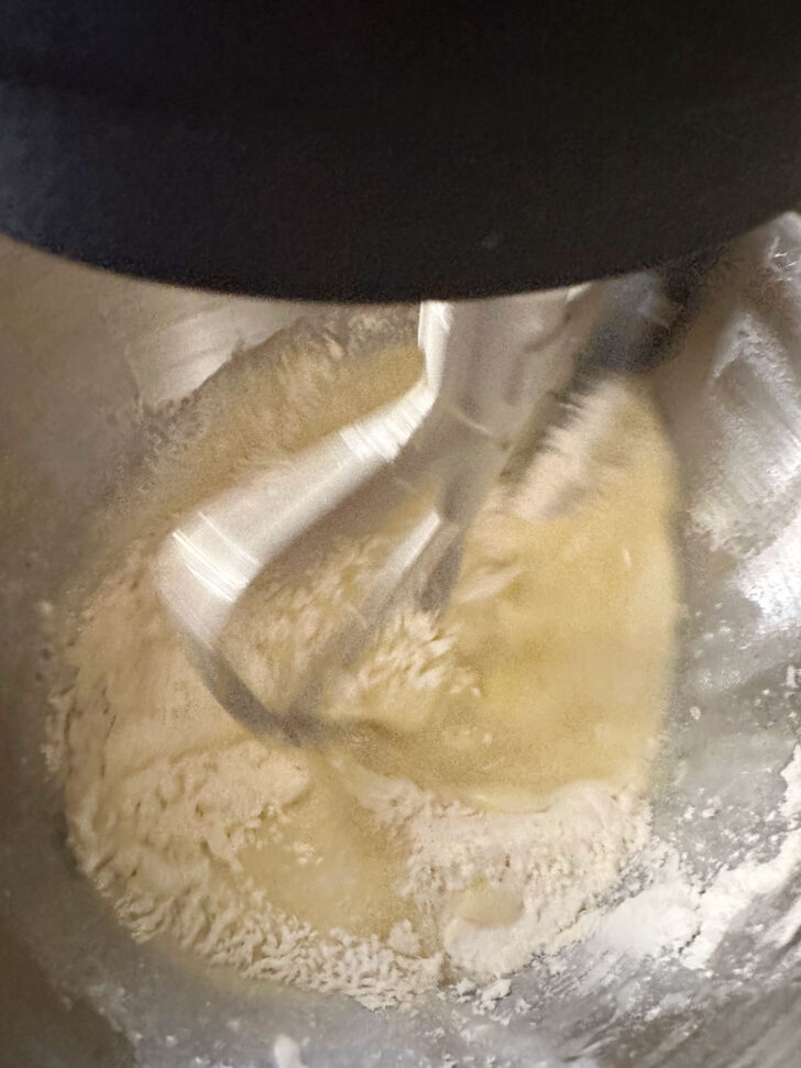 adding flour mixture to the batter