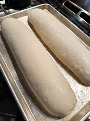 dough on baking sheet after rising