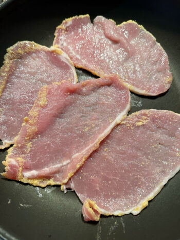 peameal bacon in frying pan