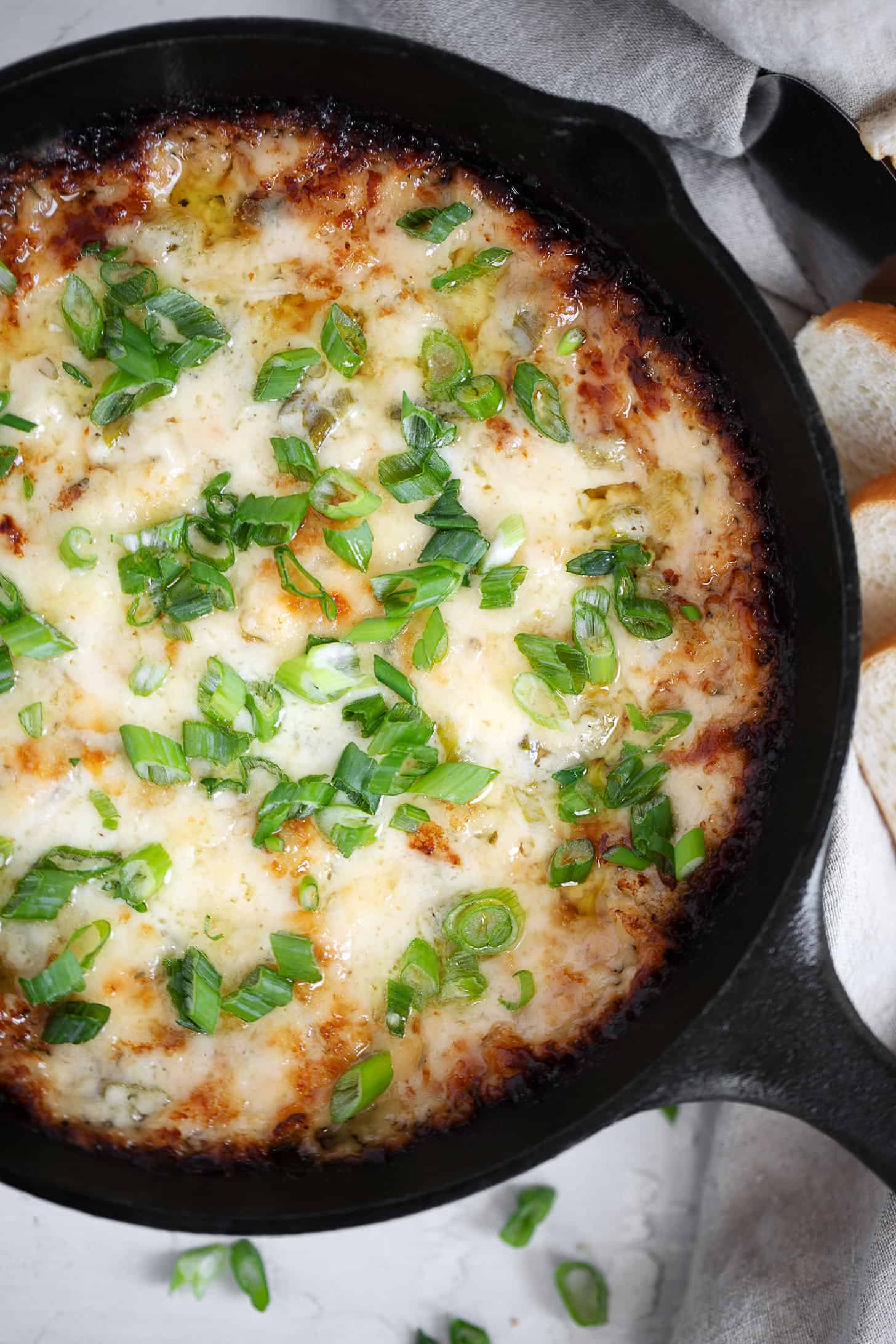 hot onion dip in cast iron skillet