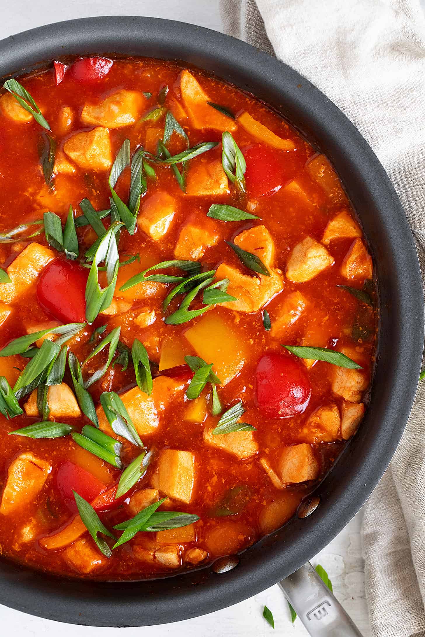 Speedy spicy chicken and peppers in skillet.