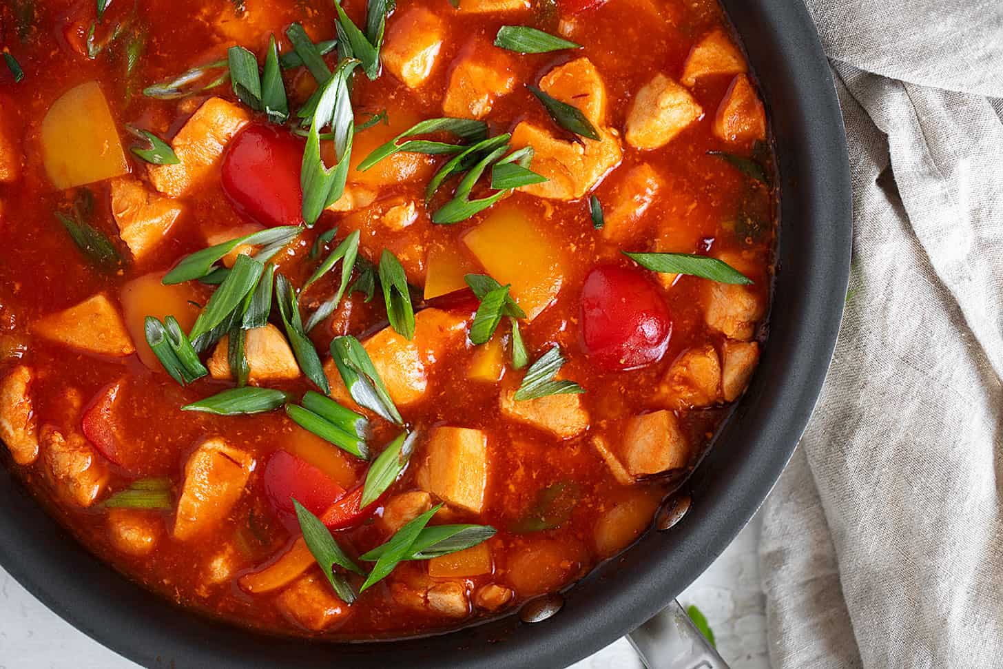 speedy spicy chicken and peppers in skillet