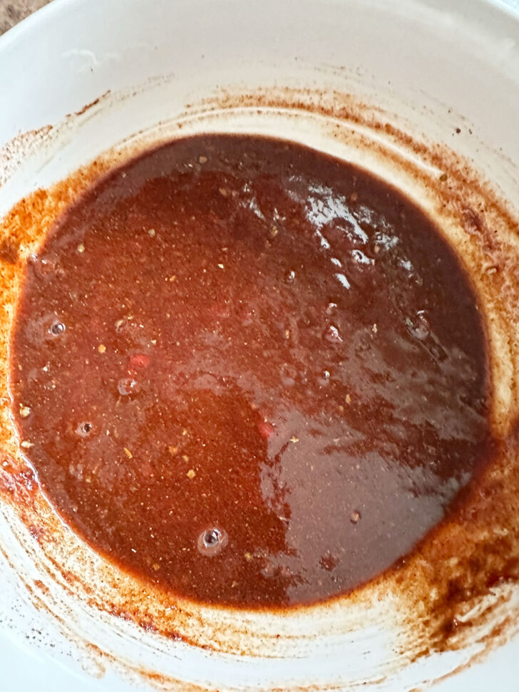 Sauce ingredients mixed up in a small bowl.