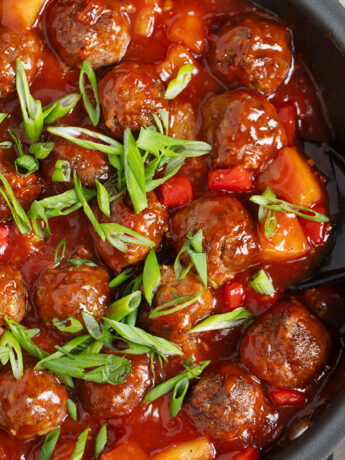 Pineapple meatballs in skillet.