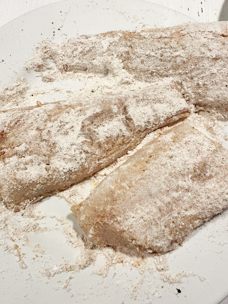 Cod after coating in the flour mixture