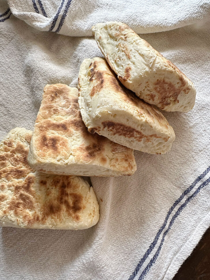 Irish soda farls on tea towel.