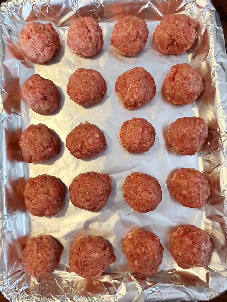 Meatballs formed and placed on baking sheet.