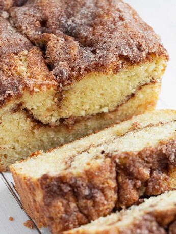 Cinnamon crunch bread sliced on board.