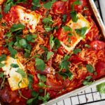Sheet pan tomato orzo in pan.