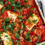 Sheet pan tomato orzo in pan.