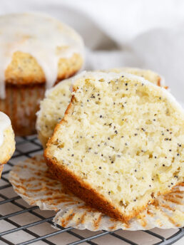 Lemon poppy seed muffins on cooling rack