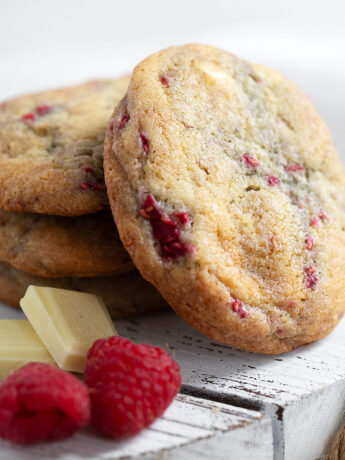 Raspberry white chocolate cookies on platter.