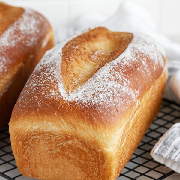 Overnight sandwich bread on a cooling rack.