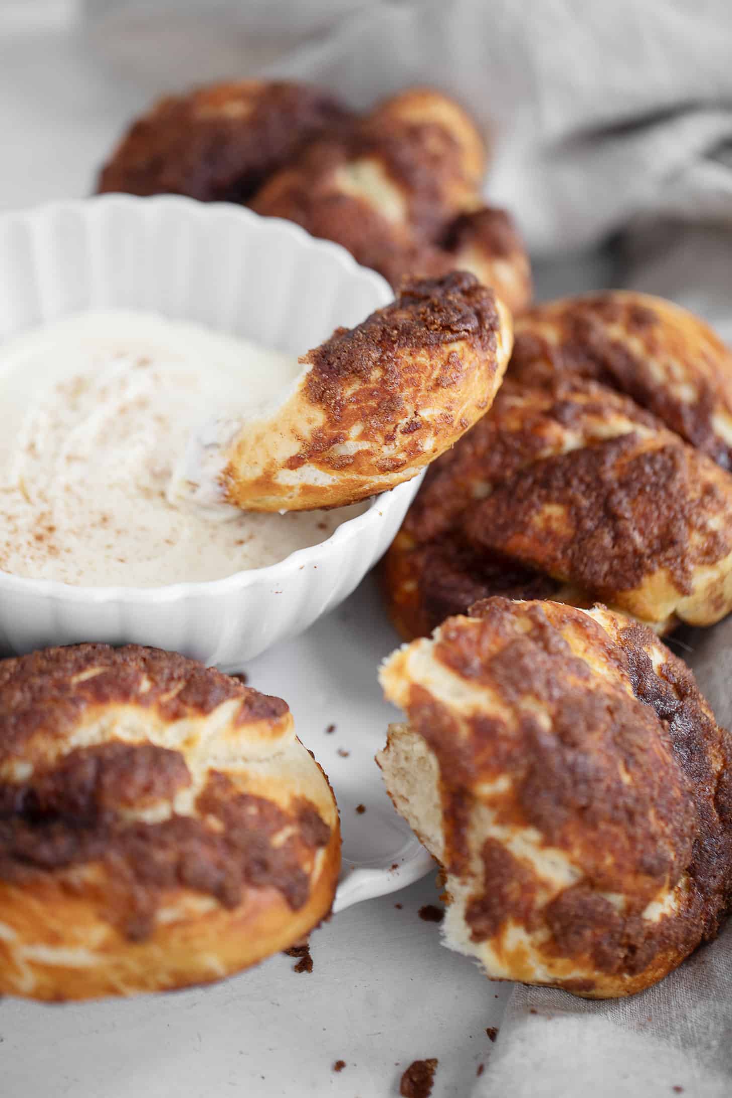 Cinnamon crunch soft pretzels served with a sweet cream cheese dip.