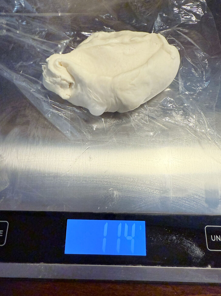 Dough being weighed out into pieces.