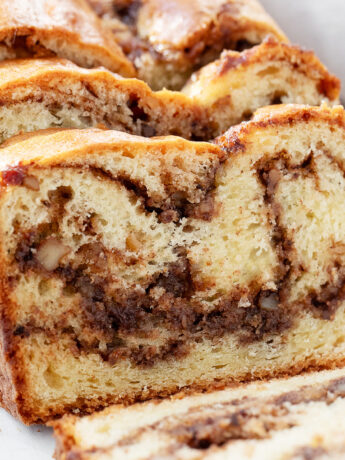 Hungarian coffee cake loaf on cutting board.
