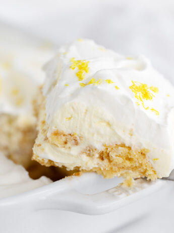 Limoncello tiramisu in serving dish with a slice out.
