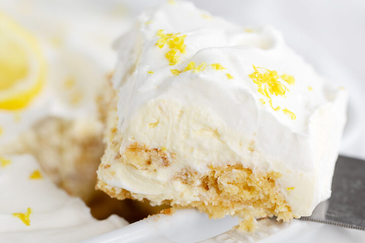 Limoncello tiramisu in serving dish with a slice out.
