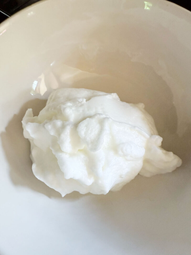 Egg whites transferred to a large bowl.