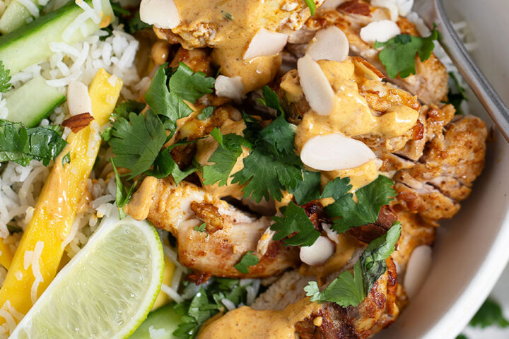 Mango chutney chicken bowl with mango rice salad.