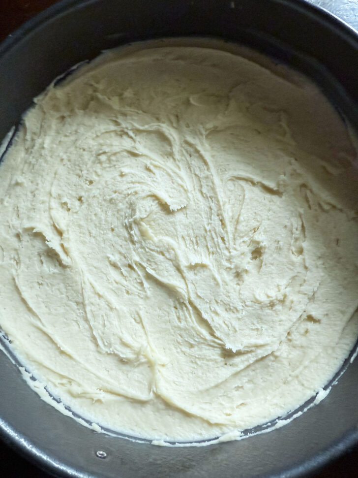 Batter spread out and levelled in the pan.
