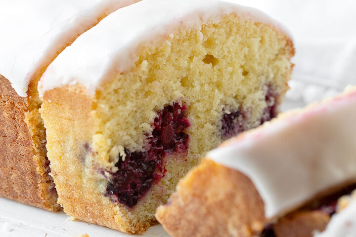 Lemon blackberry bread slices the slice plate.