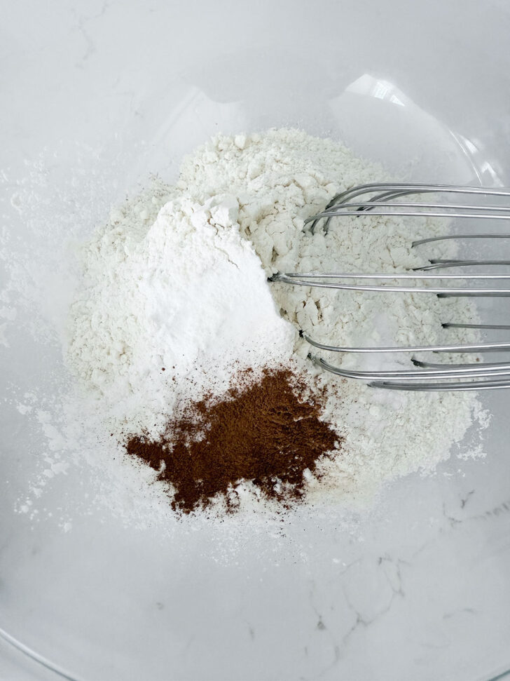 Dry ingredients added to another bowl.