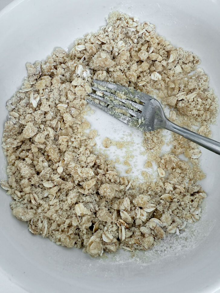 Crisp topping mixed up in a small bowl.