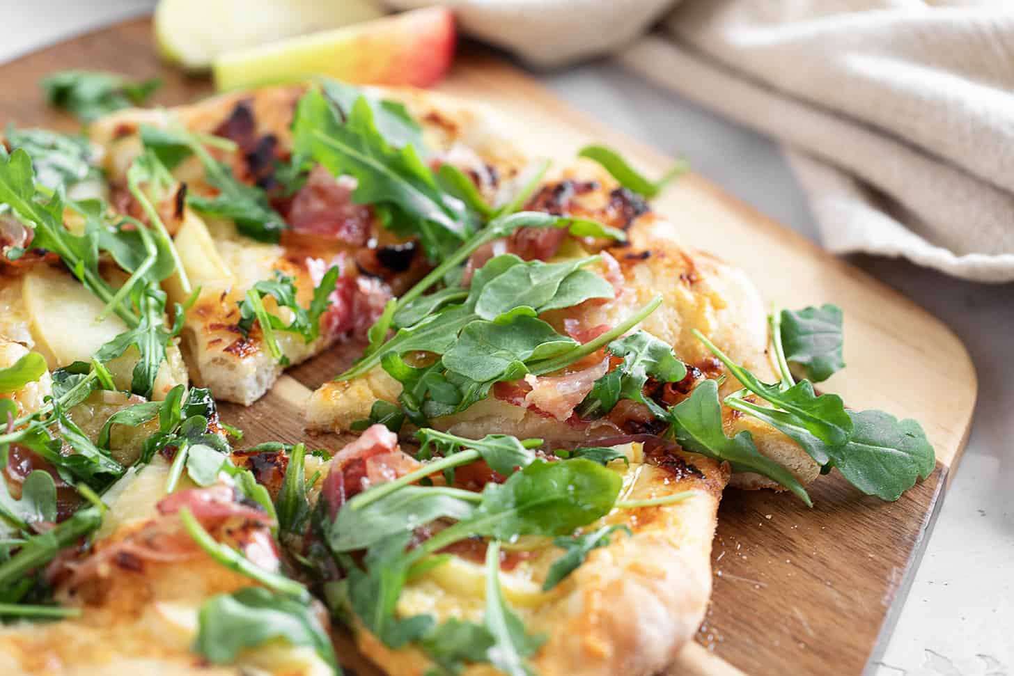 Pizza crust on Apple Cheddar and Pancetta Pizza.