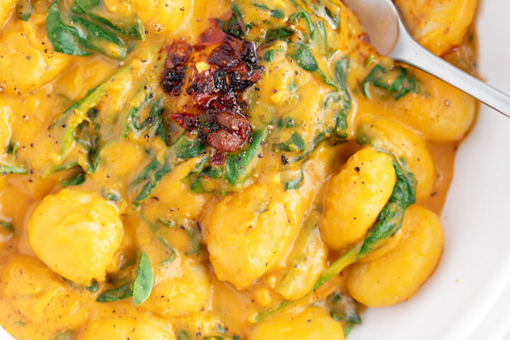 Bowl with butternut squash sauce gnocchi.