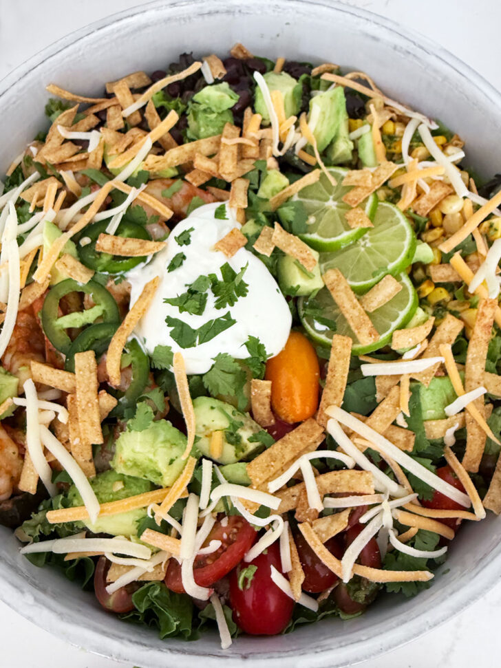 Finished salad with some sour cream and cheese added on top.