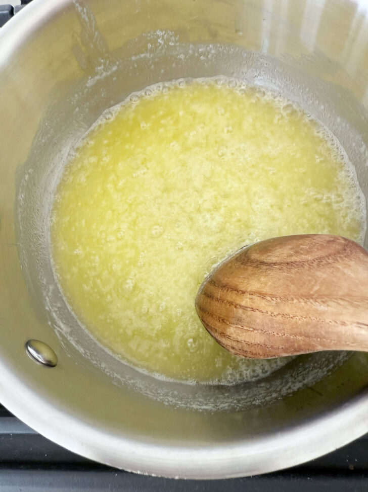 Butter melting in a saucepan.