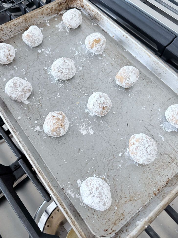 Rolled cookie dough on a baking sheet before baking.