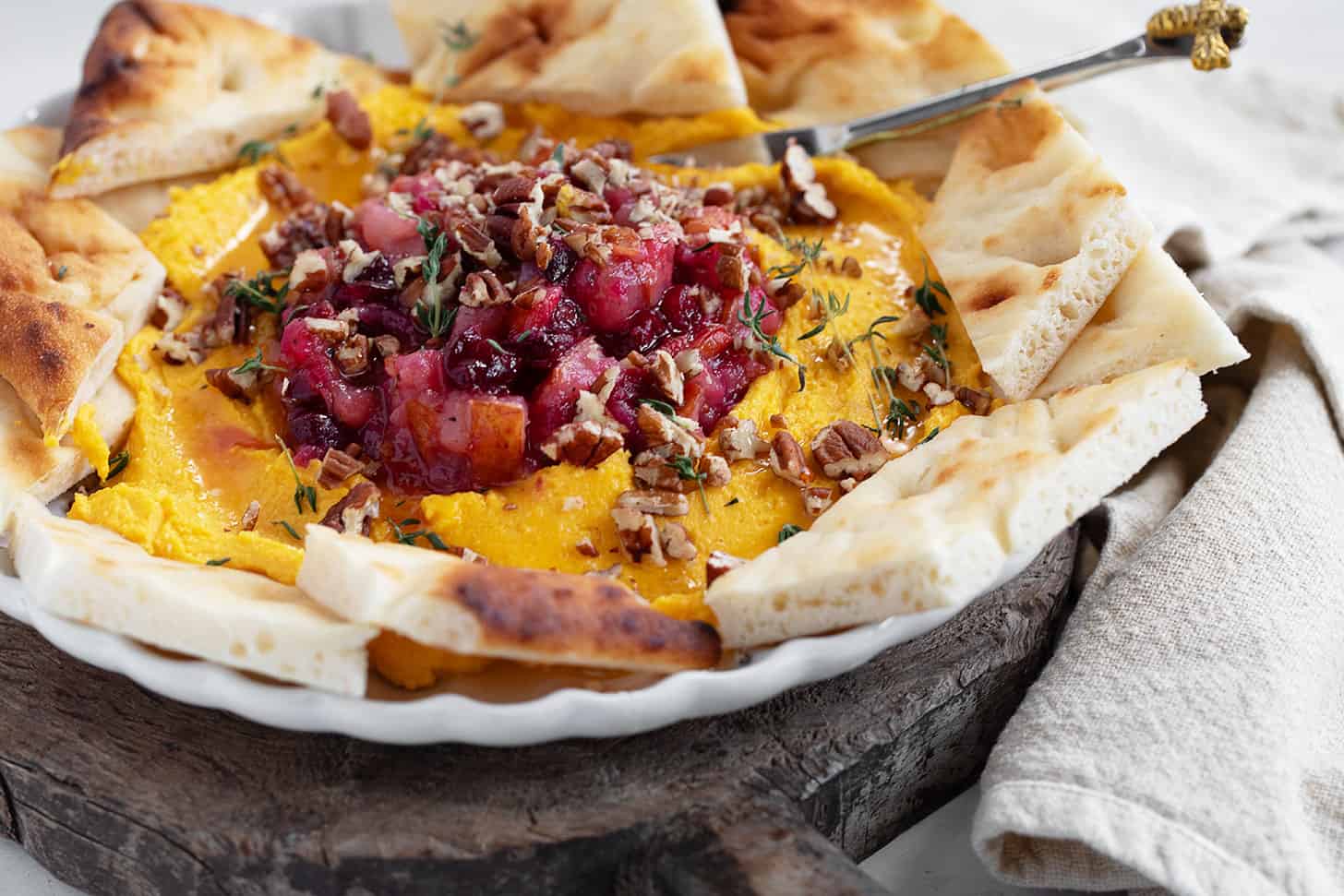 Butternut squash whipped feta on a plate.