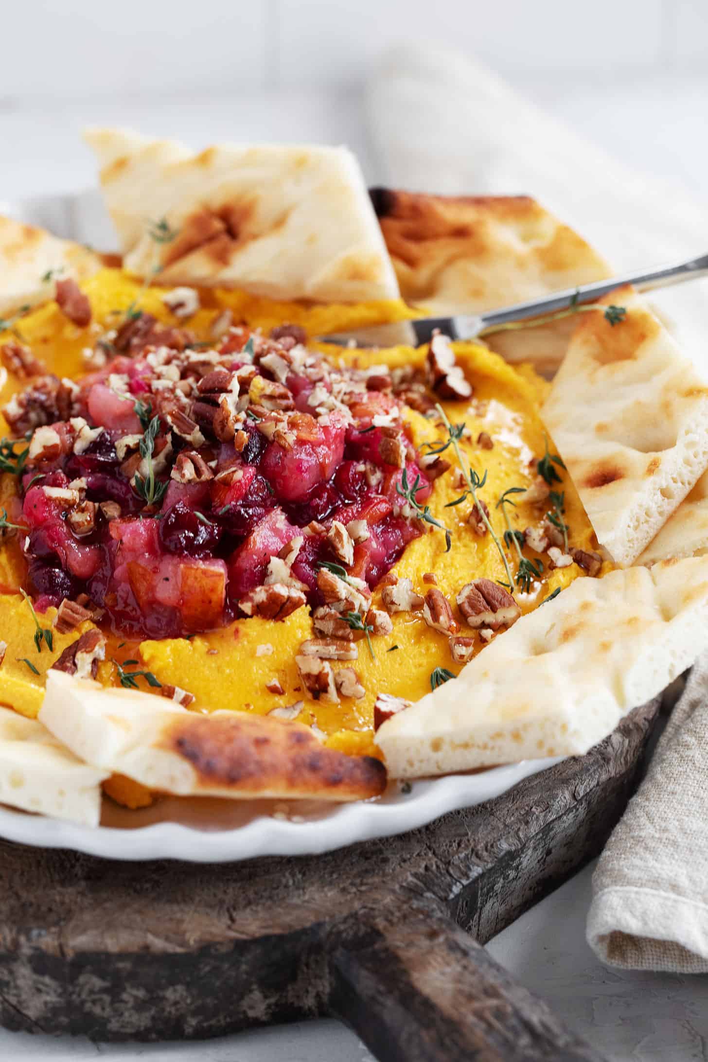Butternut squash whipped feta on a plate.
