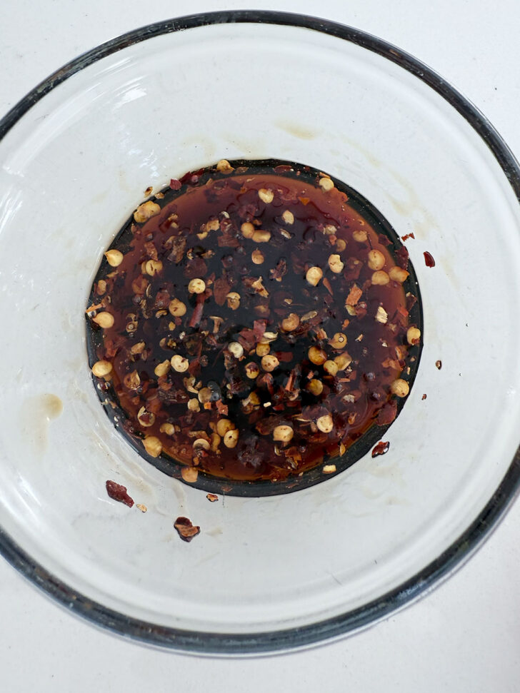 Maple chili glaze in a small bowl.