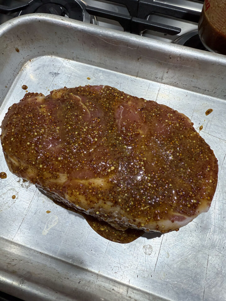 Maple Mustard Place pork in roasting pan ready for oven.