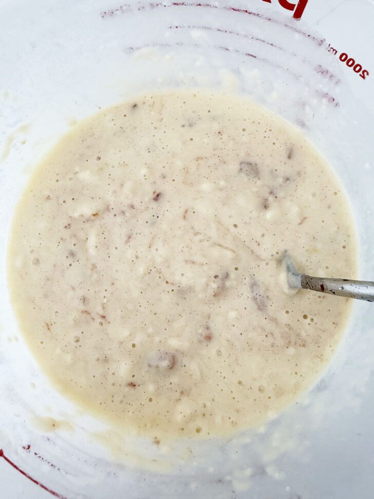 Finished waffle batter in a bowl.