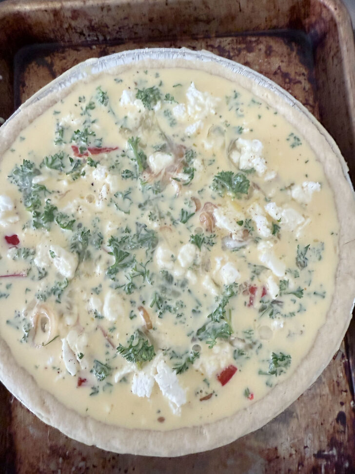 Butternut squash quiche ready for the oven.