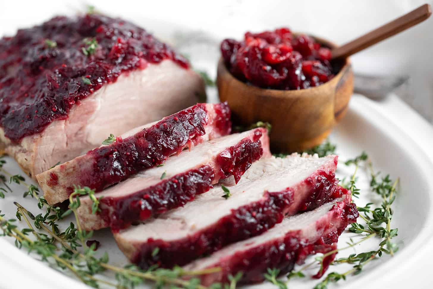 Boneless pork loin topped with a cranberry apple glaze.