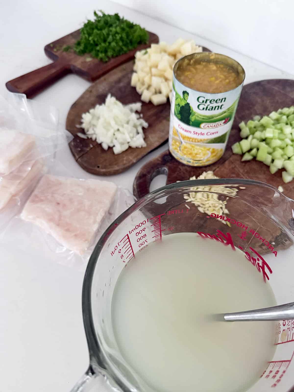 Cod chowder ingredients on the counter.