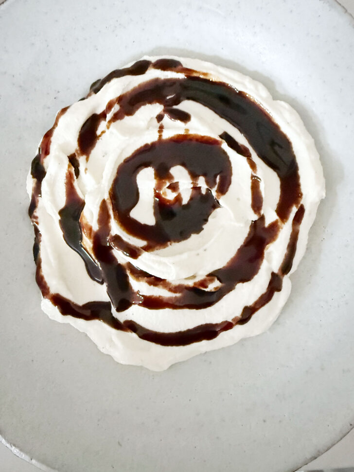 Balsamic glaze after drizzling on top of the whipped ricotta.