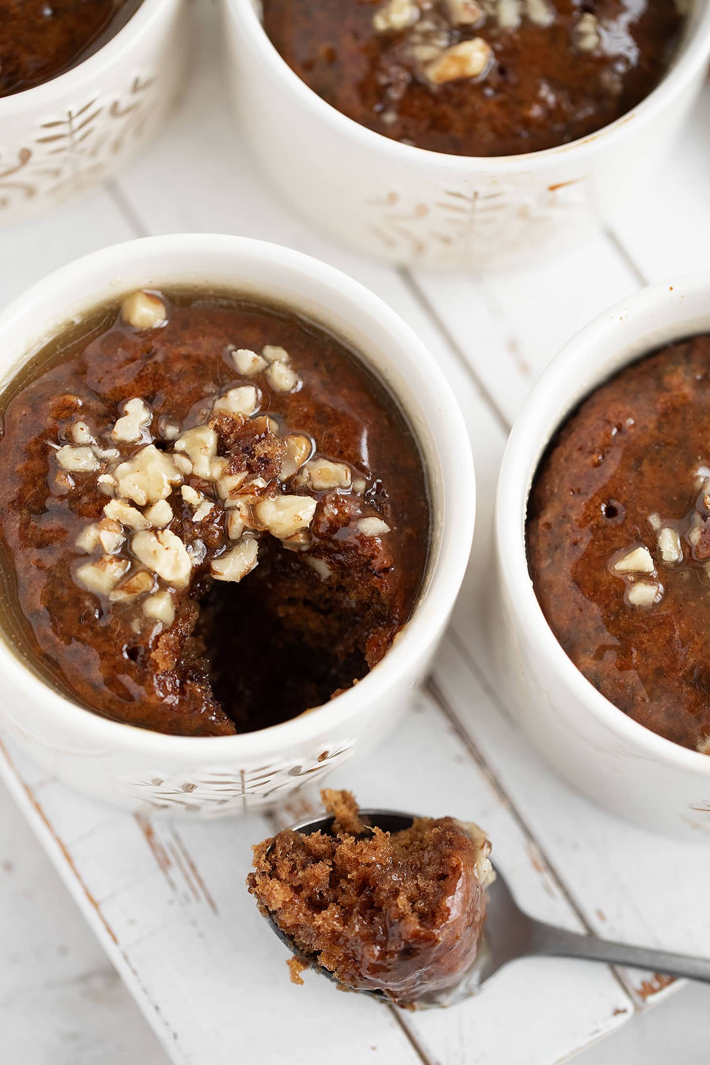 Gingerbread sticky toffee pudding in ramekins.