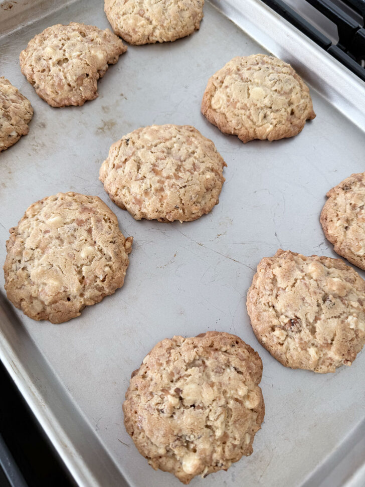 Toffee walnut white chocolate cookies after baking.