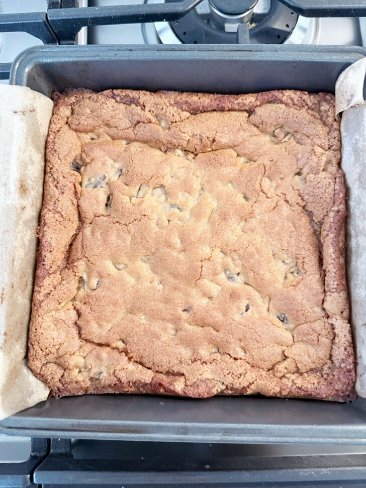 Finished date and nut chews in a baking pan.